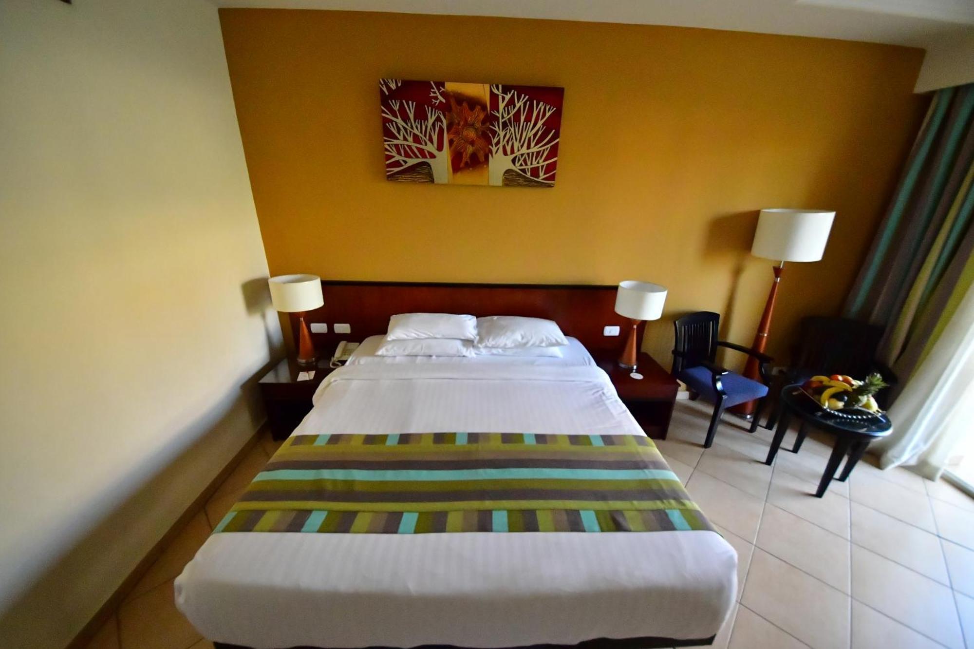 ホテル Xperience Kiroseiz Aquapark Premier-Naama Bay シャルム・エル・シェイク エクステリア 写真 A bedroom at the hotel